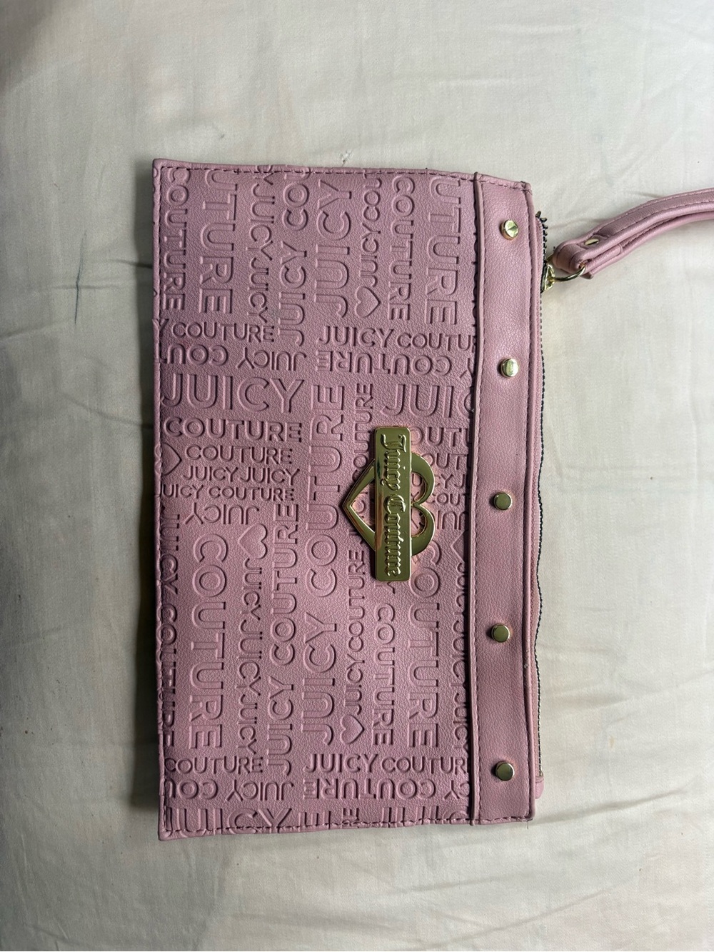 Juicy Couture Embossed Pink Wristlet with Gold Hardware
